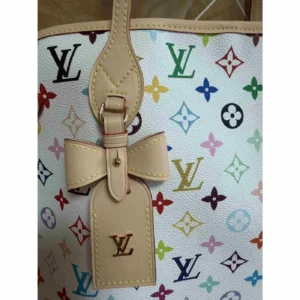 louis vuitton dog carrier bow luggage tag detail