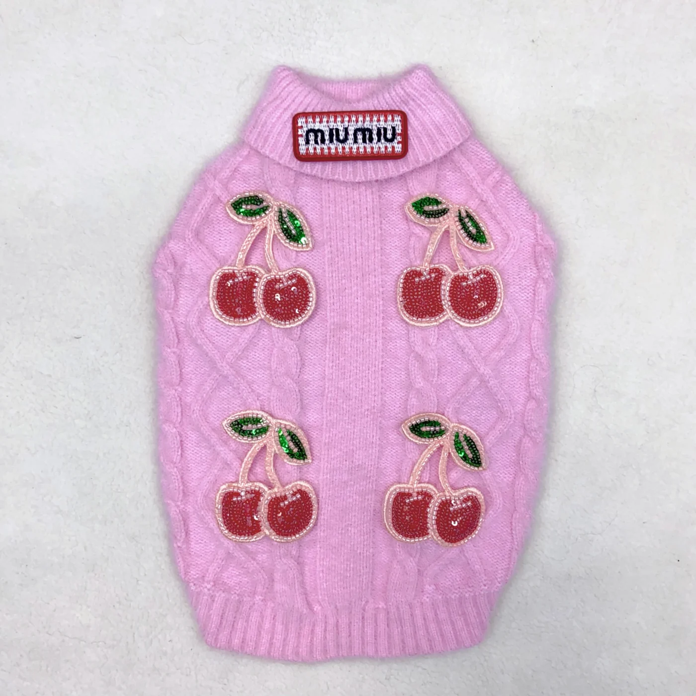 miu miu dog sweater logo patch detail