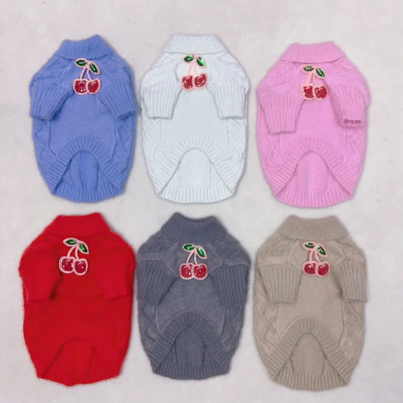 miu miu dog sweater styled flat lay
